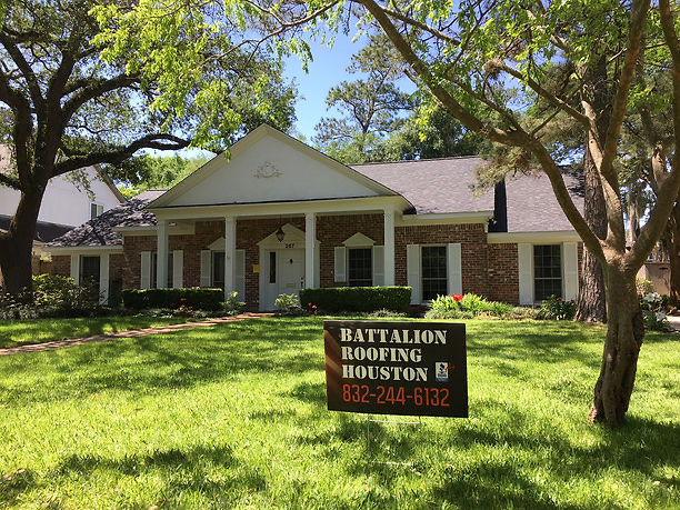 New roof on a brick ranch home with front columns in Houston