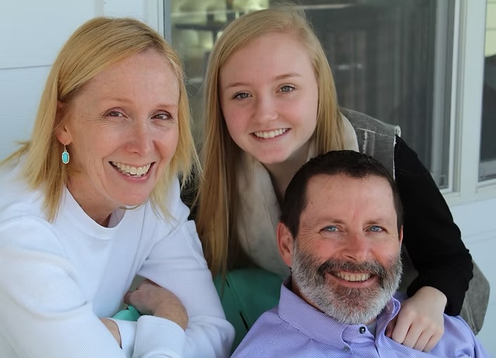 Stephen Lawlis, owner of Battalion Roofing Houston, with his family